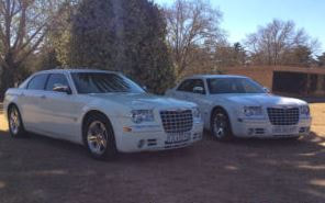 White Chrysler Sedan rental
